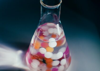 pink and white heart shaped candies in clear glass jar